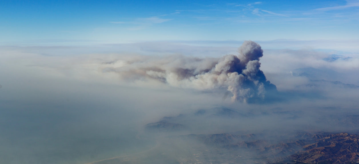 wildfire smoke from above the clouds