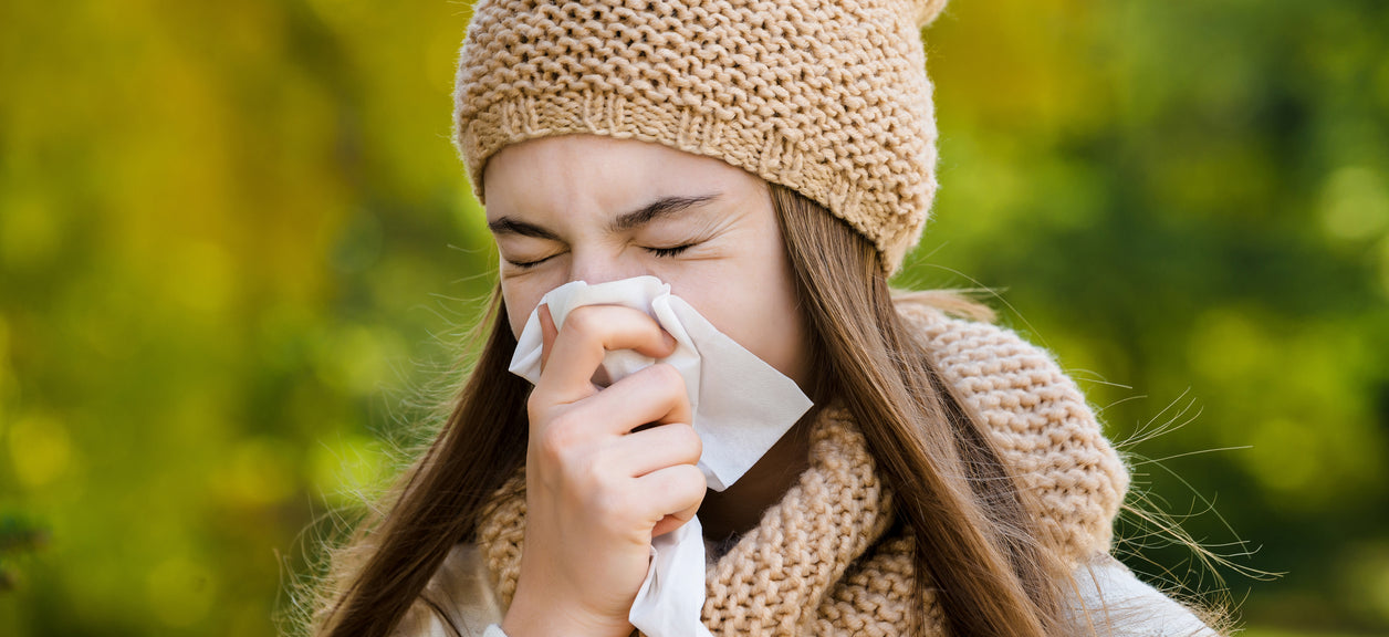 A woman suffering from fall allergies.