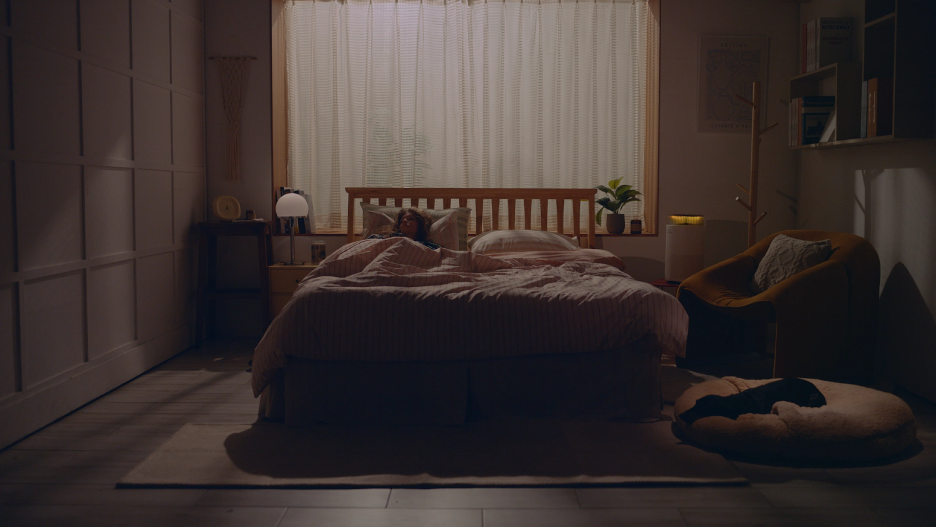 The Airmega 100 in a bedroom at night.