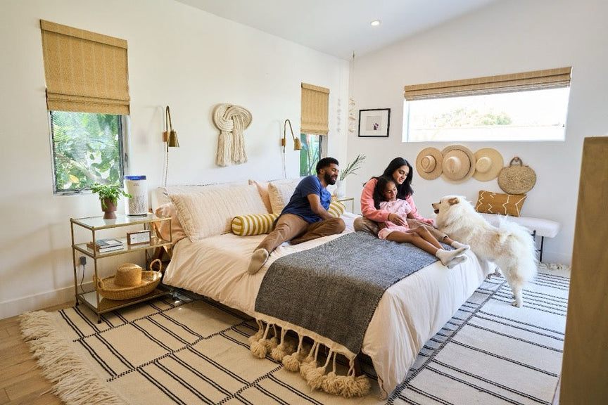 The Airmega 50 in a bedroom with a family.