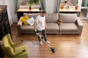 A person cleaning before National No Housework Day.