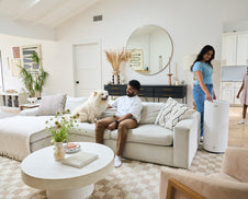 A family with a dog and Airmega 350