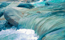 water rolling over rocks