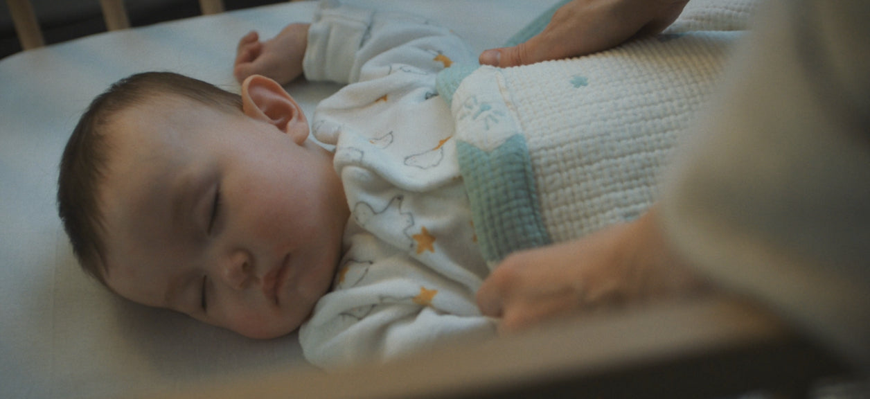 baby sleeping in the crib