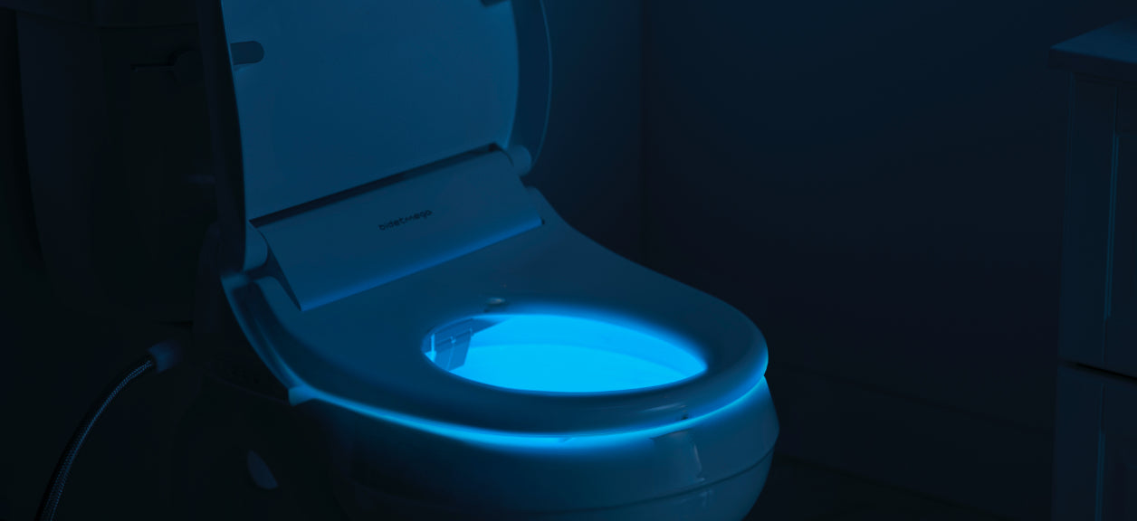 bidet glowing blue in the dark