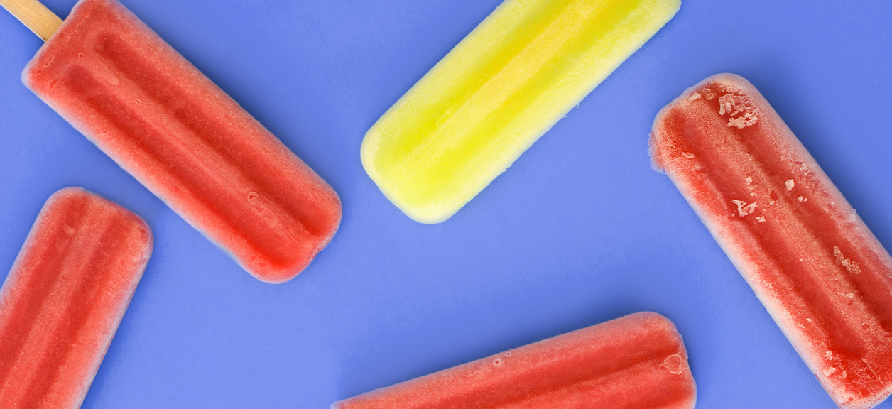 popsicles on a purple background