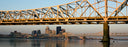 bridge with city in background