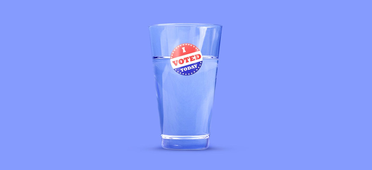 glass of water with vote sticker