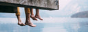 feet hanging off dock
