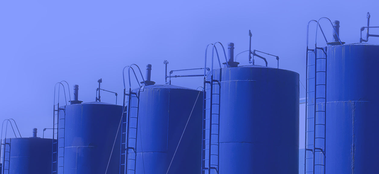 water tanks on purple background