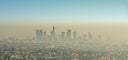 city in behind heavy smog