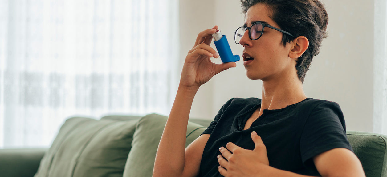 woman using an inhaler