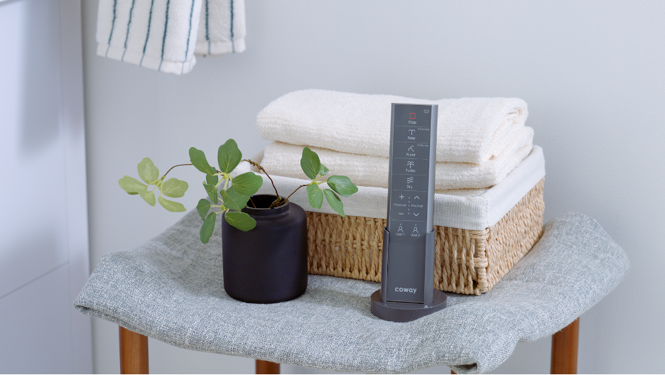 A Bidetmega remote in a bathroom.