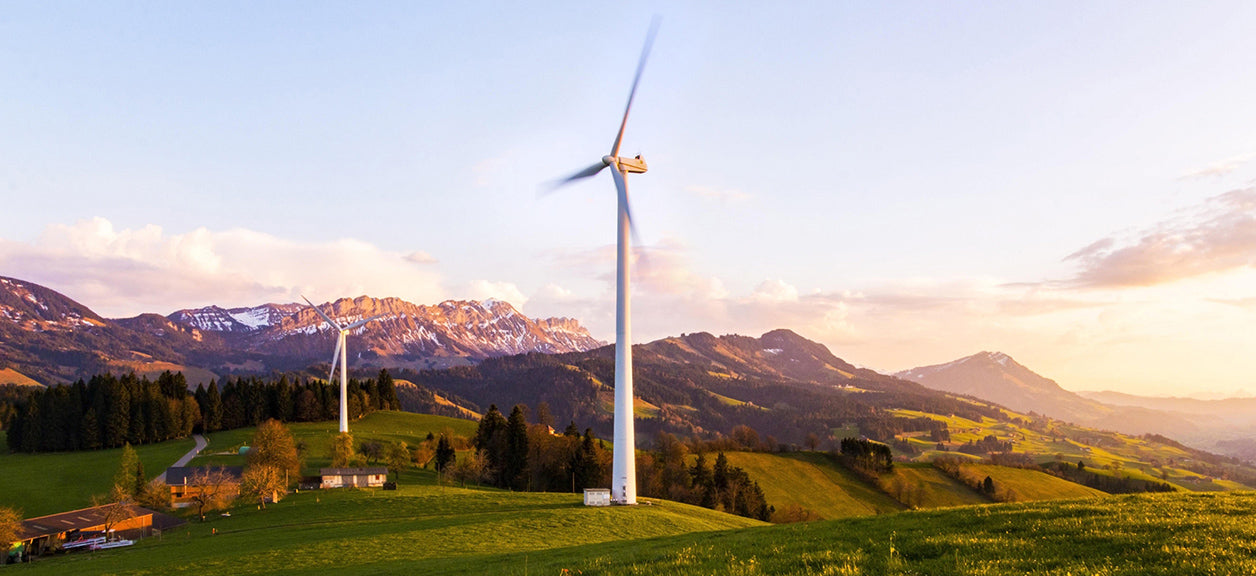 windmill with mountains in background