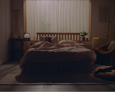 The Airmega 100 in a bedroom at night.