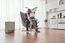 The Airmega 250 next to a person hugging their dog.