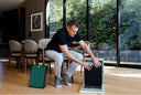 A person opening their Airmega 160 air purifier.