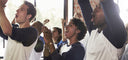 people cheering and clapping