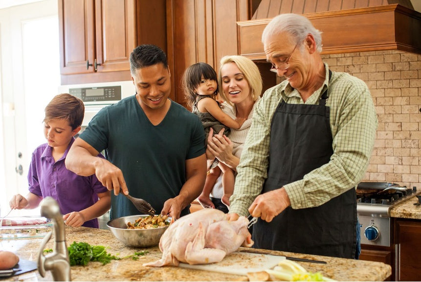 A family cooking on Thanksgiving.