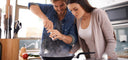 couple cooking in kitchen