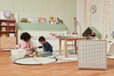 Coway Airmega 250S Air Purifier in Kid's room with kids playing
