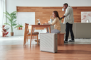 Coway Airmega 250S Air Purifier in kitchen With couple