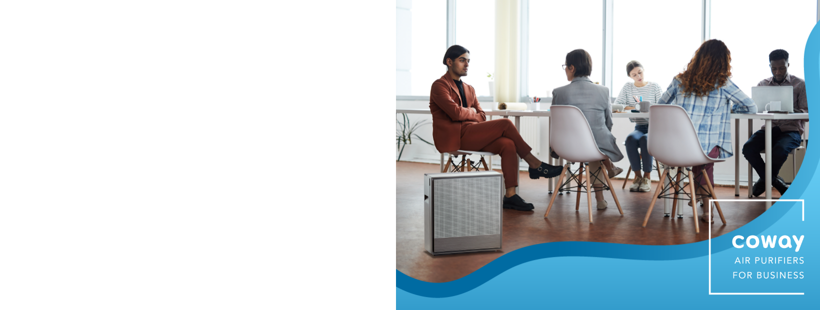 Office workers sitting at desks with Coway Airmega air purifier in the room